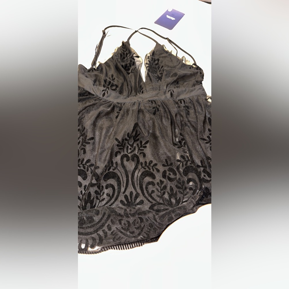 A new black lacy dress
